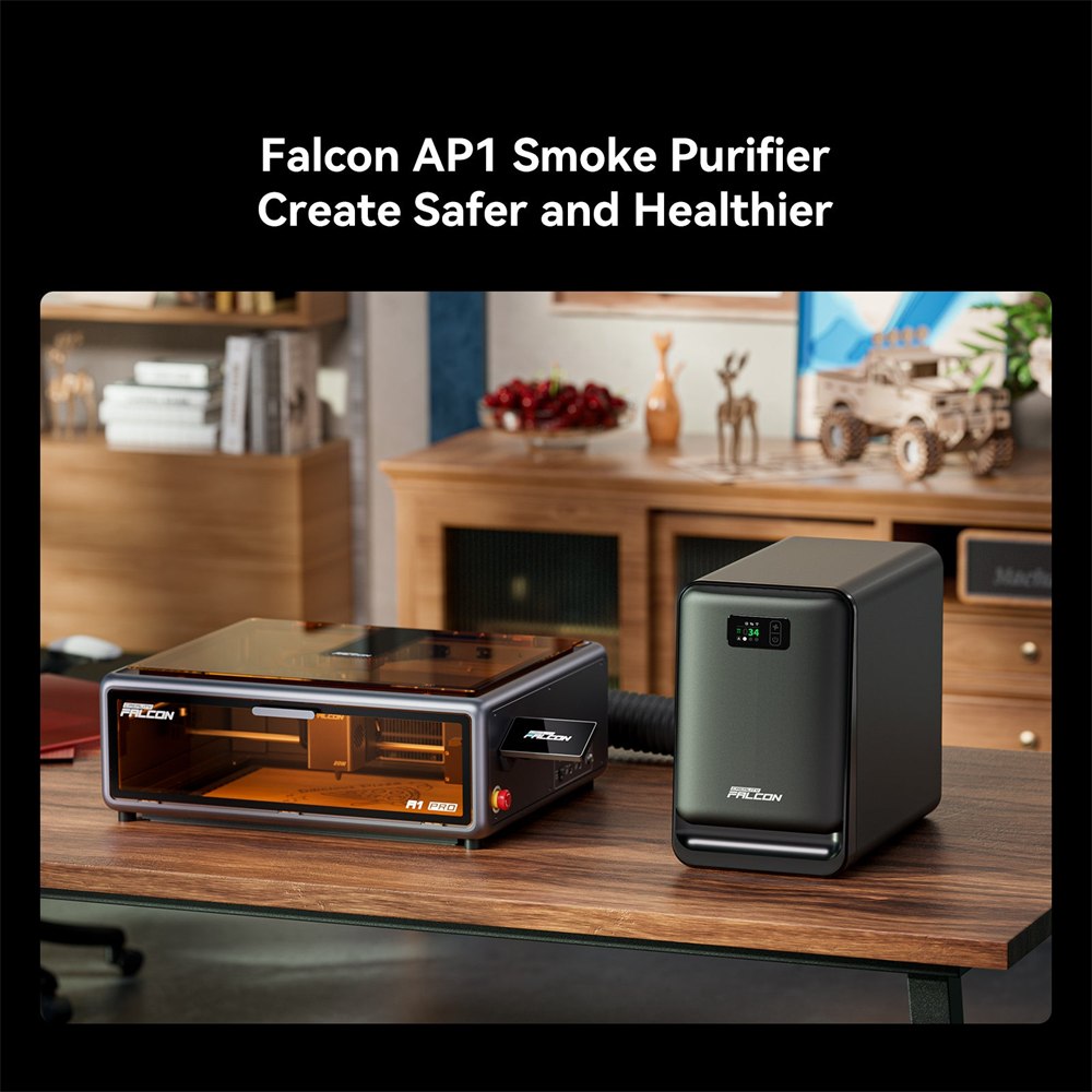 Falcon A1 Pro set up on a desk beside a smoke purifier